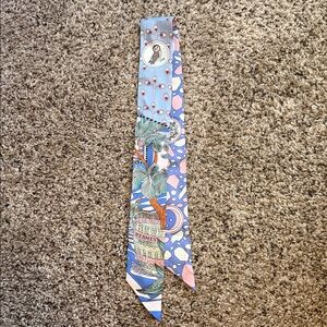 Hermès "La Danse des Amazones" 100% silk twilly scarf in new condition, no box.